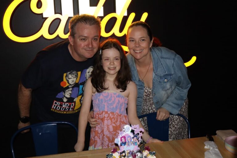 Family celebrating a birthday at Hey Caddy Macarthur indoor mini golf venue