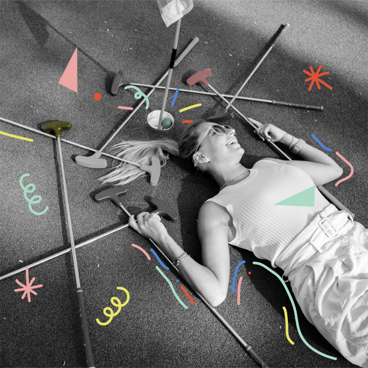 Black and white photo of a woman lying down at Hey Caddy