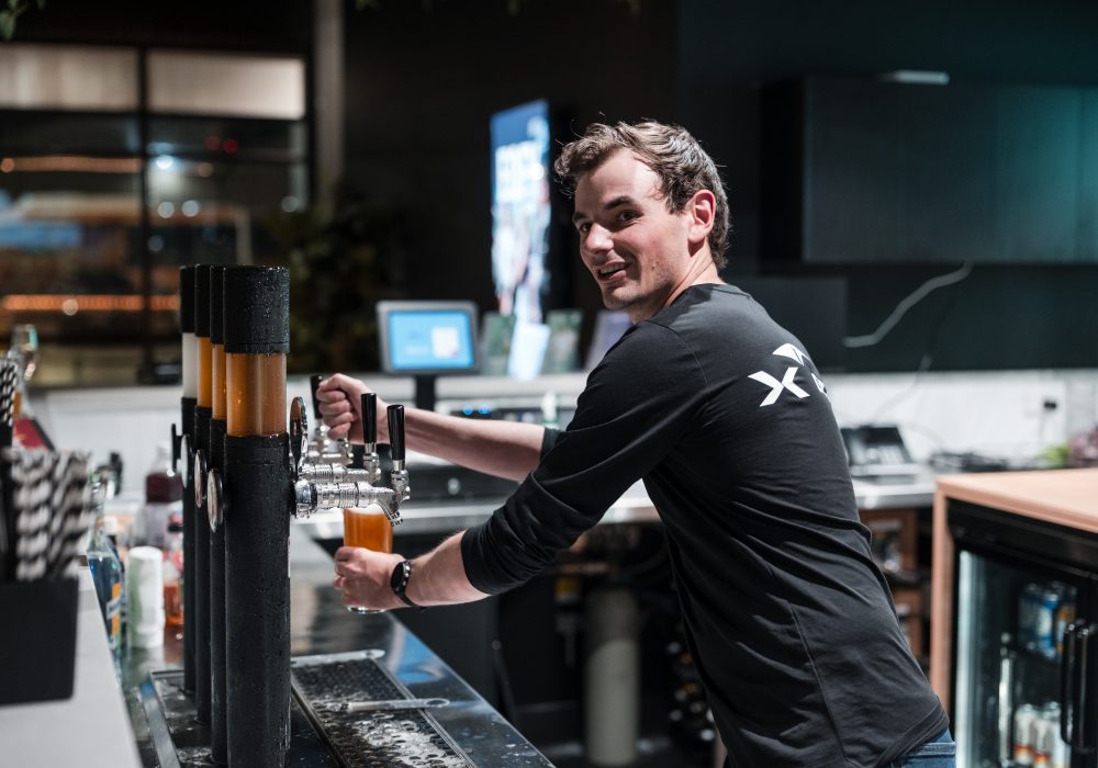 Barista Serving Beer